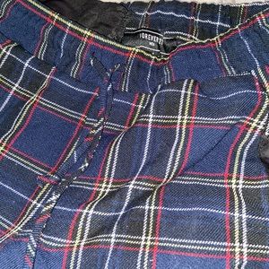 Dark blue white yellow red striped dress pants